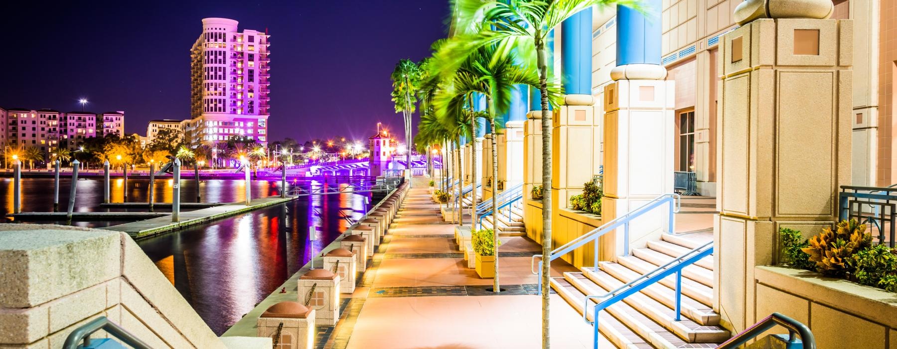 a building next to a dock in a city